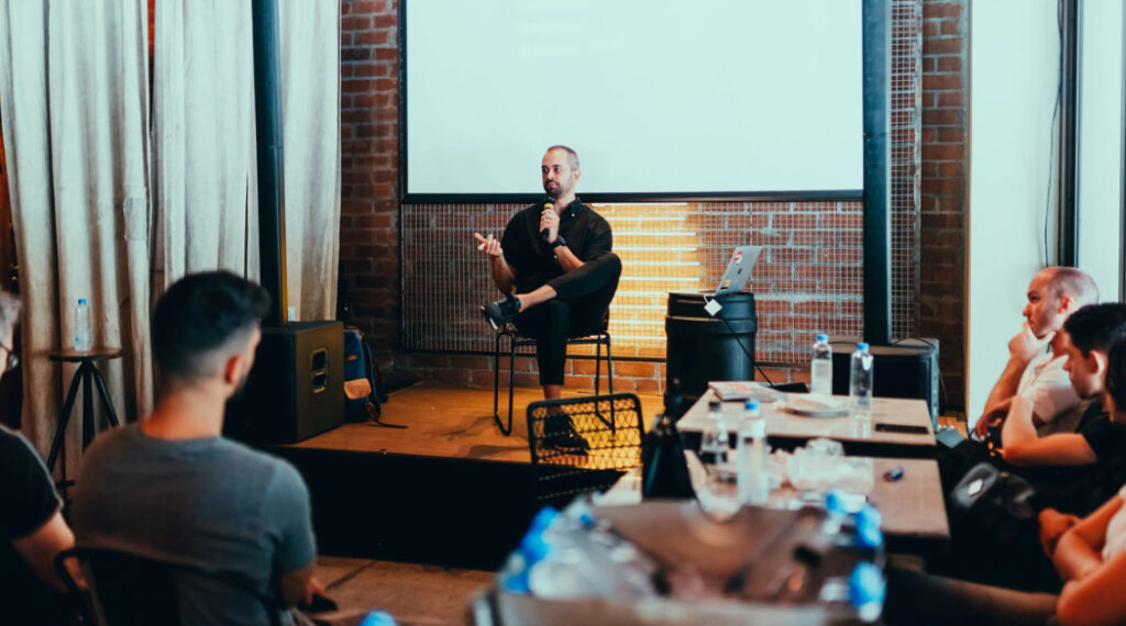 Speaker at a seminar with attendees